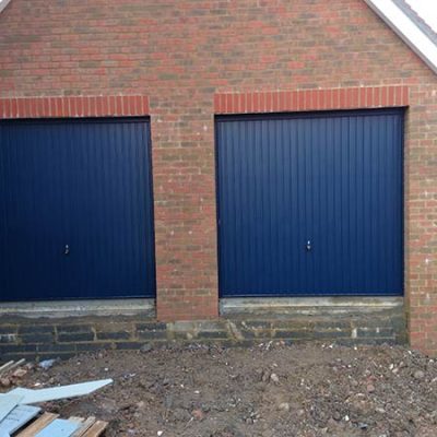 blue electric double garage doors