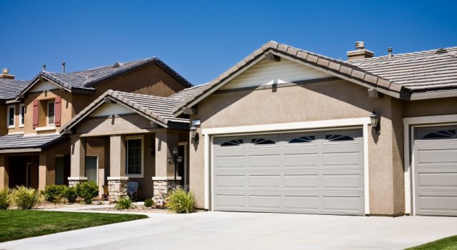 Wide grey garage door.