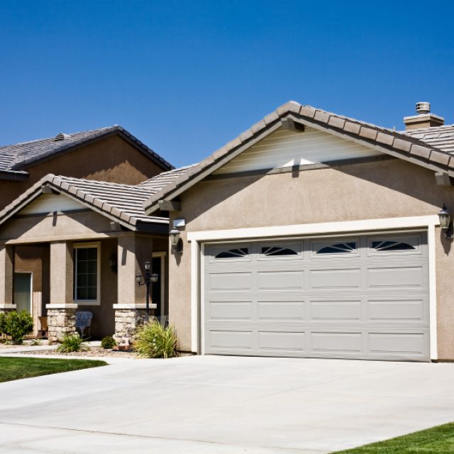 Wide grey garage door.