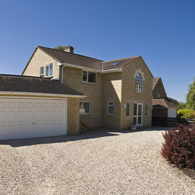 Side view of a large white garage door.