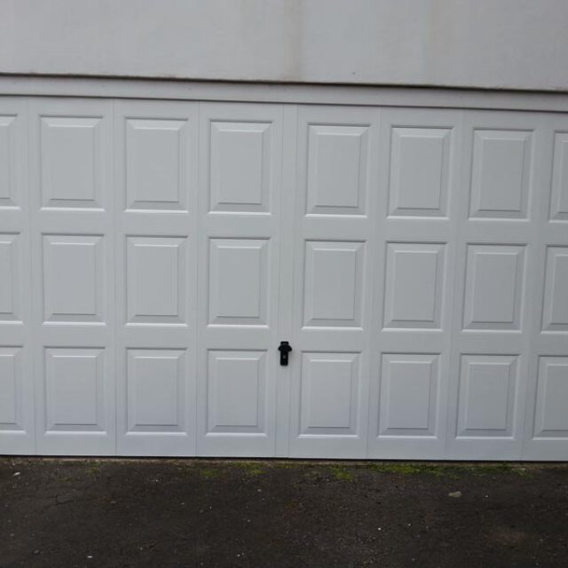 White up and over garage door.